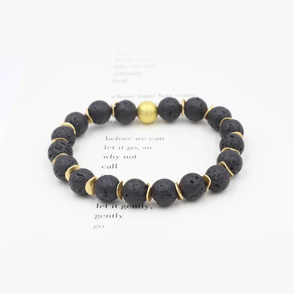 Susan Balaban Designed Healing Bracelet - This black healing yoga bracelet is made of lava stones and gold for adventure.