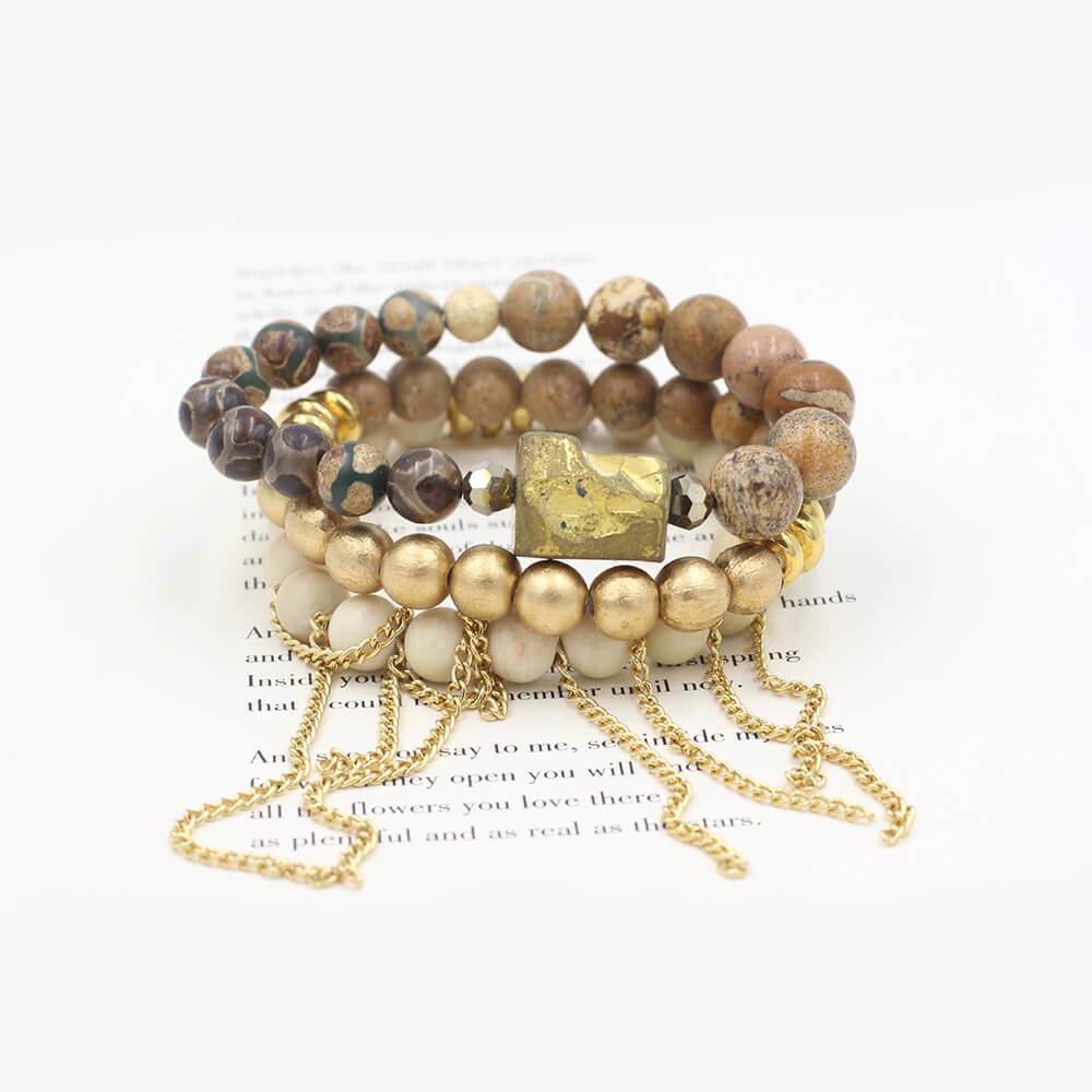 Susan Balaban Designed Healing Bracelet - THese gold and white healing yoga bracelets are made of wood, jasper and riverstone with evil eye for protection, power and positivity.