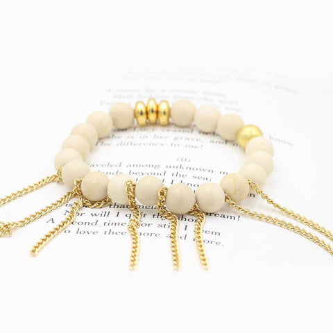 Susan Balaban Designed Healing Bracelet - This cream healing yoga bracelet is made of white jasper and fringe for clarity, gratitude and calm.